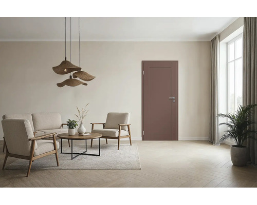 Moderne Innentür in einem hell eingerichteten Wohnzimmer mit Lounge Bereich und Parkettboden.