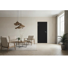 Ein elegantes Wohnzimmer mit moderner schwarzer Innentür, beigen Sesseln, Sofa, Rundtisch und natürlicher Dekoration in heller Umgebung.