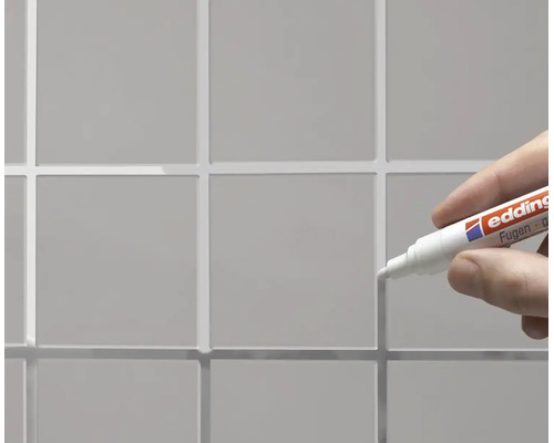 Edding Fugenmarker zur Reparatur und Auffrischung von Fliesen Fugen an einer Wand