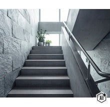 Moderne Betontreppe in einem hellen Treppenhaus mit Natursteinwand und Metallgeländer sowie Grünpflanzen auf dem Treppenpodest. (Image AI modified or generated)