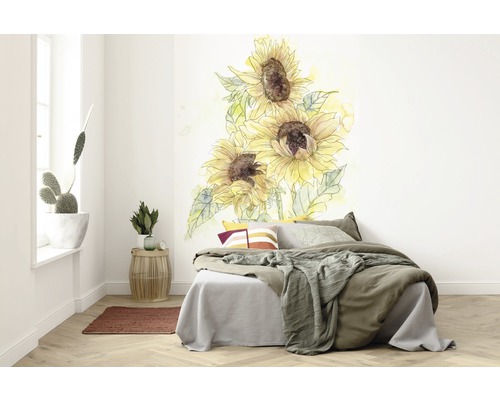 Schlafzimmer mit Wandtattoo aus Sonnenblumen über dem Bett