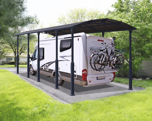 Doppelcarport Palram – Canopia Alpine 10600 359 x 1077 cm anthrazit Wohnmobil unter einem Unterstand mit Fahrrädern auf der Rückseite