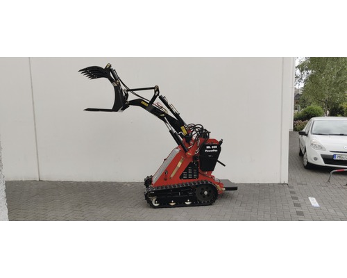 Kompaktlader mit Schaufel und Raupenantrieb