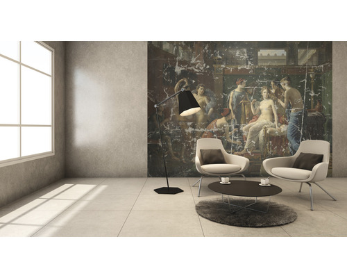 Wohnzimmer mit Wandbild, Sesseln, Stehlampe und Teppich