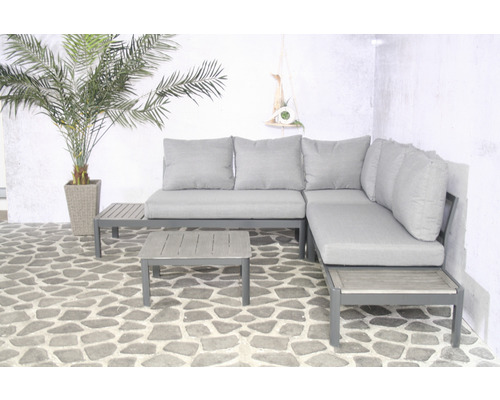 Graue Gartenloungegruppe mit Tisch und Zierpflanze