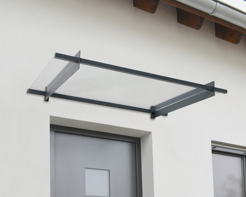Vordach aus Metall und Glas über einer Haustür