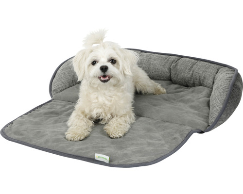 Hund liegt in einem grauen Hundebett von Kerbl