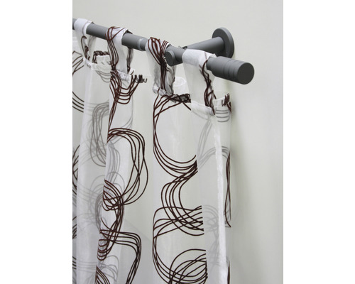 Gardine mit Schlaufenaufhängung und abstraktem Muster an Gardinenstange