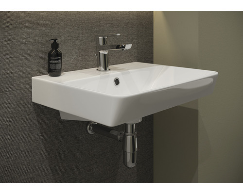 Keramikwaschbecken mit Armatur und Siphon