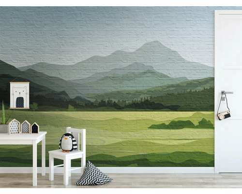 Wandgestaltung mit Berglandschaft und Backsteinmuster in einem Kinderzimmer