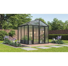 Gewächshaus im Garten mit Pflanzen und Blumen