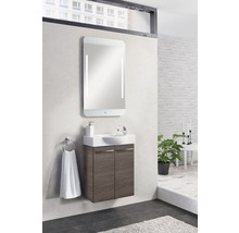 Modernes Badezimmer mit Waschtischunterschrank, Waschbecken und beleuchtetem Spiegel
