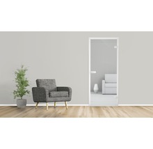 Innenraum mit Sessel, Pflanze und Innentür mit Glaseinsatz