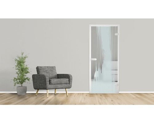 Innenraum mit Sessel, Zimmerpflanze und Designtür aus Glas