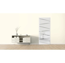 Helles Zimmer mit Kommode und Designtür