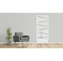 Innenraum mit Sessel, Zimmerpflanze und Designtür