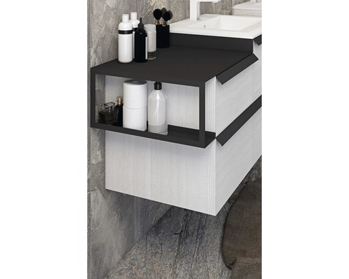 Detailansicht eines Badezimmerschranks mit Ablagefläche und Schubladen.