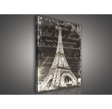 Leinwandbild mit dem Eiffelturm und Schriftzügen im Vintage Stil