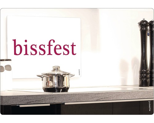 Herdabdeckplatte mit dem Schriftzug bissfest und einem Kochtopf