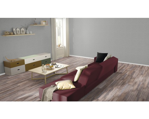 Wohnzimmer mit Sofa, Couchtisch und Kommode