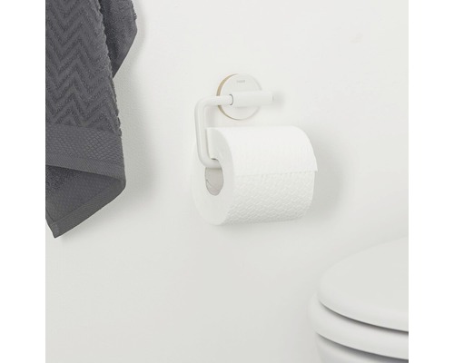 Toilettenpapierhalter mit Papierrolle an der Wand