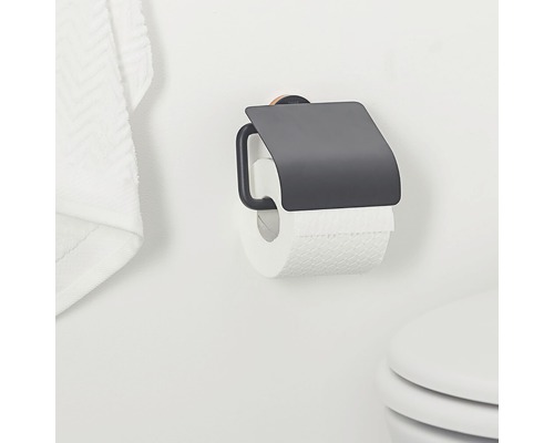 Toilettenpapierhalter mit Abdeckung an einer Wand