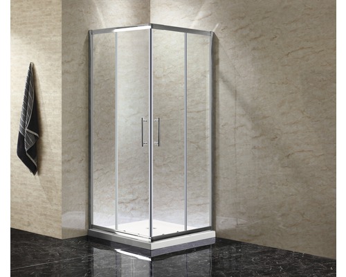 Eckdusche mit klaren Glastüren und silberfarbenen Rahmen im Badezimmer