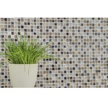 Mosaikfliese mit Pflanzen in einem Topf