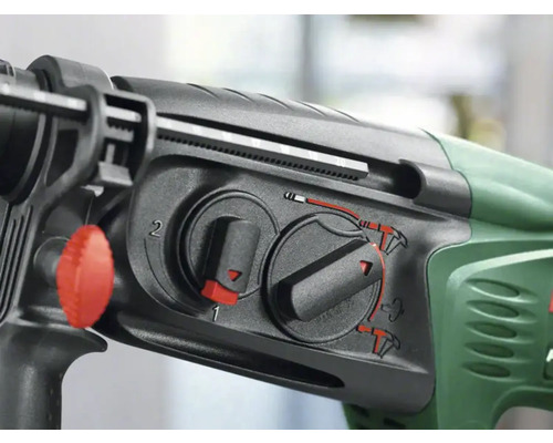 Nahaufnahme einer Bohrmaschine mit Wahlschaltern zur Einstellung verschiedener Bohrmodi