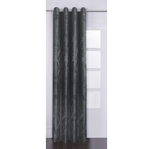 Dekoschals mit Ösen und Muster vor einem Fenster