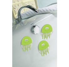 Badewanne mit Antirutschmatten im Quallen Design neben einem Wasserhahn