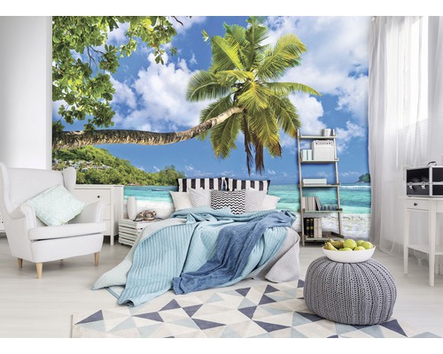 Schlafzimmer mit Fototapete mit Palmenmotiv