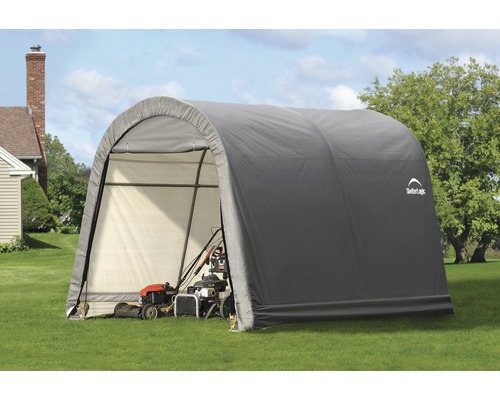 Gerätehaus ShelterLogic Shed-in-a-Box 300 x 300 cm grau Graue Geräteaufbewahrung mit Gartengeräten auf Rasen