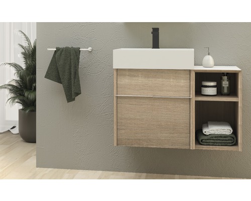 Modernes Badezimmer mit Waschtisch, Handtuch und Pflanzen