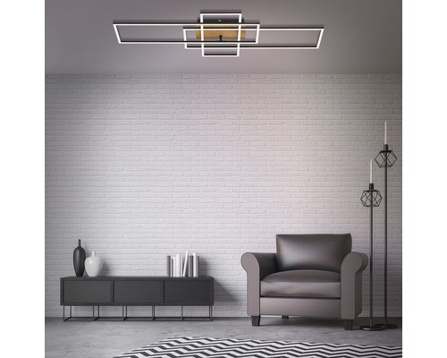 Modernes Wohnzimmer mit LED Deckenleuchte und Einrichtung