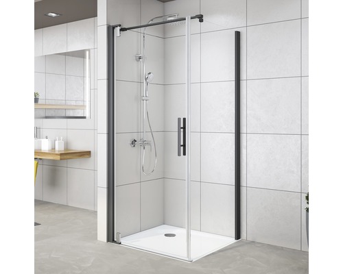 Eckdusche mit schwarzem Rahmen und Duscharmatur in modernem Badezimmer