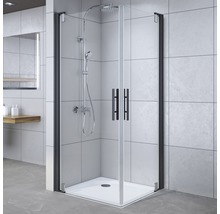 Duschkabine mit schwarzem Rahmen und Duschtasse im Badezimmer.