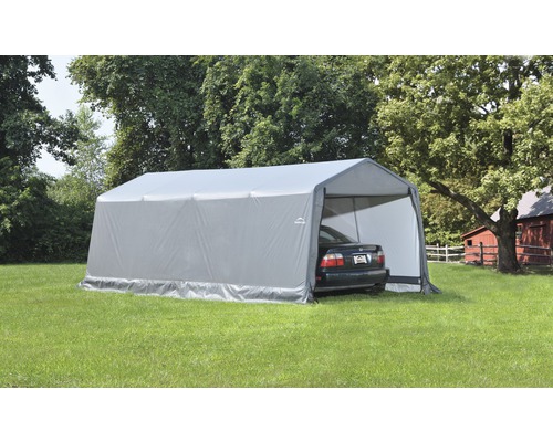 Graues Zeltcarport mit Auto auf einer Rasenfläche