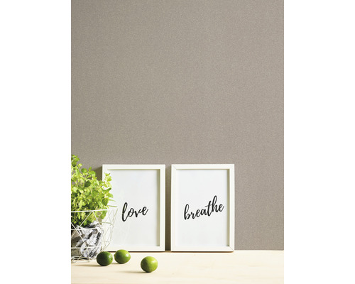 Fototapete mit zwei Rahmen mit den Aufschriften Liebe und Atmen, Pflanze und Limetten