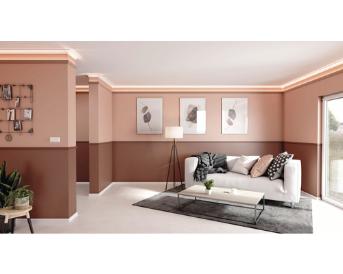 Wohnzimmer mit Stuckprofilen, LED-Bändern und modernen Möbeln für eine stilvolle Raumgestaltung.