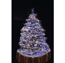 Weihnachtsbaum mit Lichtern und Baumstammsockel