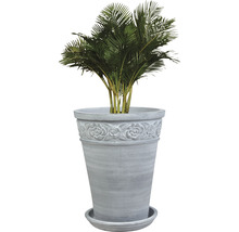 Kunstpflanze Palme in einem Pflanzgefäß mit Untersetzer