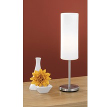 Dekorative Tischleuchte mit Vase und Blume auf einem Tisch