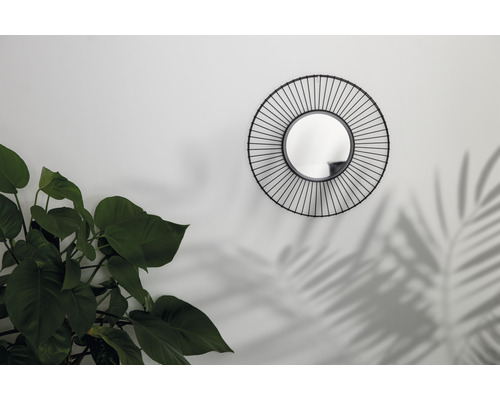 Runder Wandspiegel mit Pflanzen-Dekoration