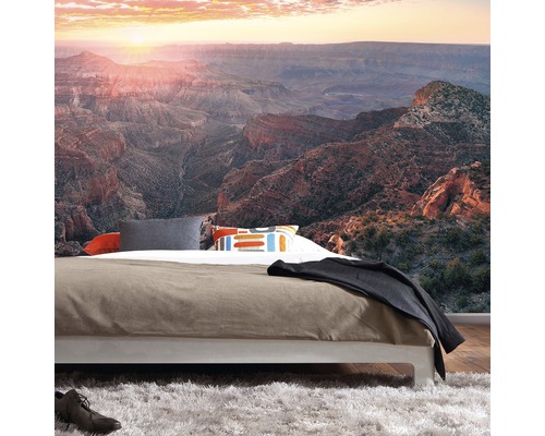 Schlafzimmer mit Fototapete eines Canyons bei Sonnenaufgang