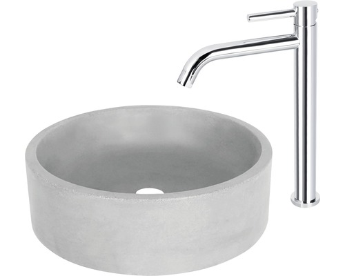 Rundes Waschbecken aus Beton mit verchromter Armatur