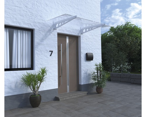 Hausfassade mit Haustür, Briefkasten, Hausnummer und Vordach