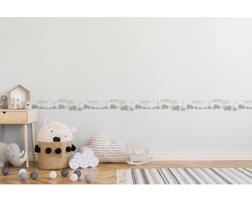 Kinderzimmer mit Bordüre mit Elefanten- und Baumdesign