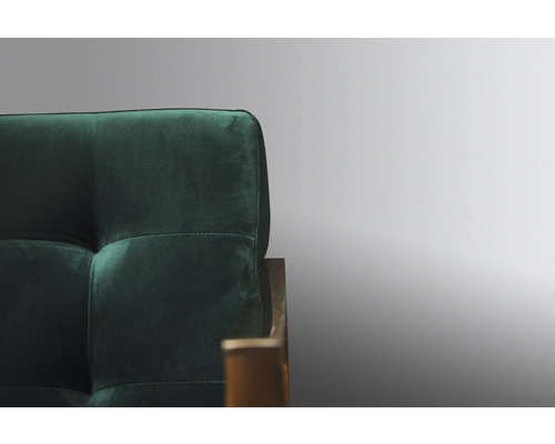 Detailansicht eines grünen Sofas mit Polsterung