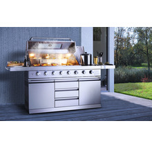 Grillküche aus Edelstahl mit geöffnetem Deckel und Grillgut